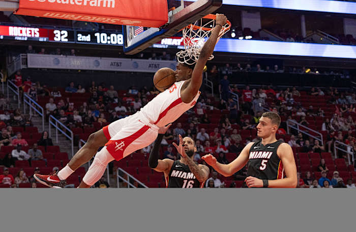 Rockets' Amen Thompson dunks against the Miami Heat in Friday's preseason victory inside the Toyota Center.